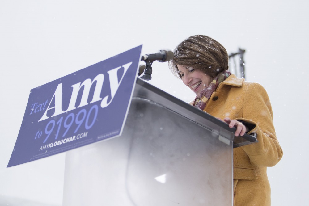 Sen. Amy Klobuchar, D-Minn., smiles as the crowd cheers for her as she prepares to announce her bid for the presidency on Sunday, Feb. 10 at Boom Island Park in Minneapolis.