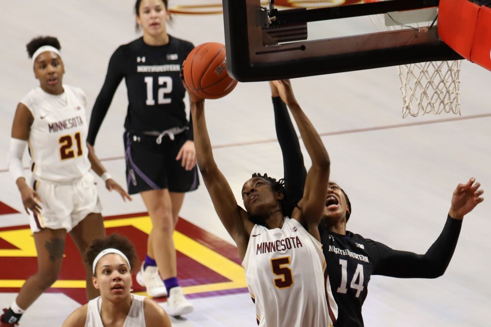 Junior Taiye Bello goes up to shoot during the Gopher game against Northwestern on Sunday, Feb. 10 at Williams Arena.