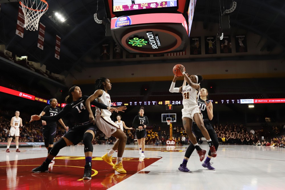 Jasmine Brunson jumps to shoot the ball during the game against Northwestern on Sunday, Feb. 10 at Williams Arena in Minneapolis.