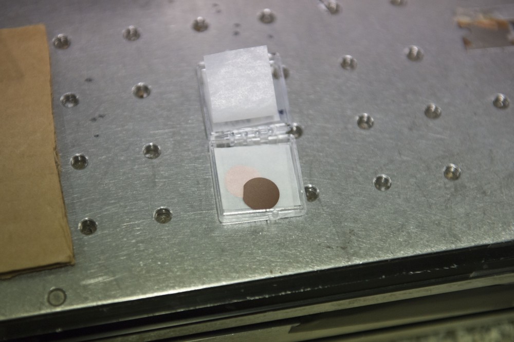A porous metal wafer sits on a table on Tuesday, Feb. 12 in Keller Hall on the East Bank campus. This wafer has billions of holes and is used to create nano wires.