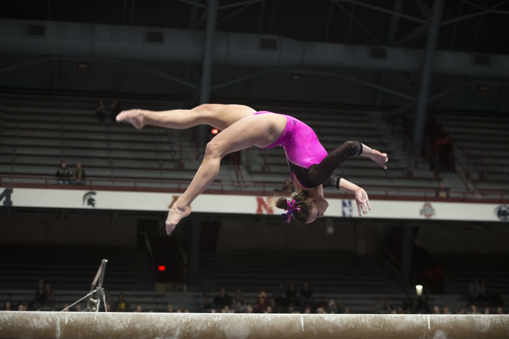 Sophomore Lexy Ramler competes on the balance beam at Maturi Pavilion on Friday, Feb 15.