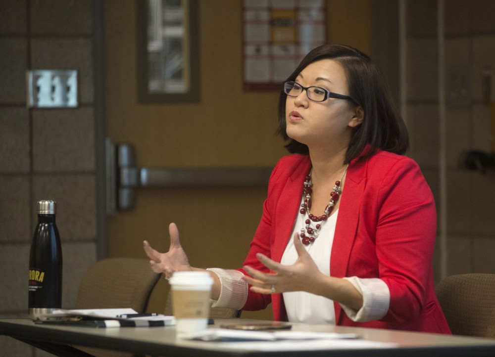Director of the Aurora Center Katie Eichele speaks on Tuesday, Feb. 19 at a town hall by the Universitys Professional Student Government and Council of Graduate Students. The meeting was held to discuss concerns about sexual misconduct on campus. 