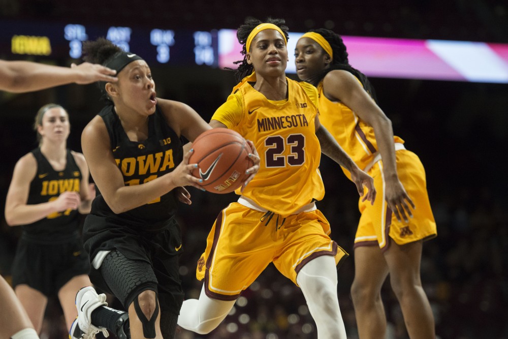 Redshirt senior Kenisha Bell chases after the ball on Monday, Jan. 14 at Williams Arena. The Gophers lost to the Hawkeyes 81-63.