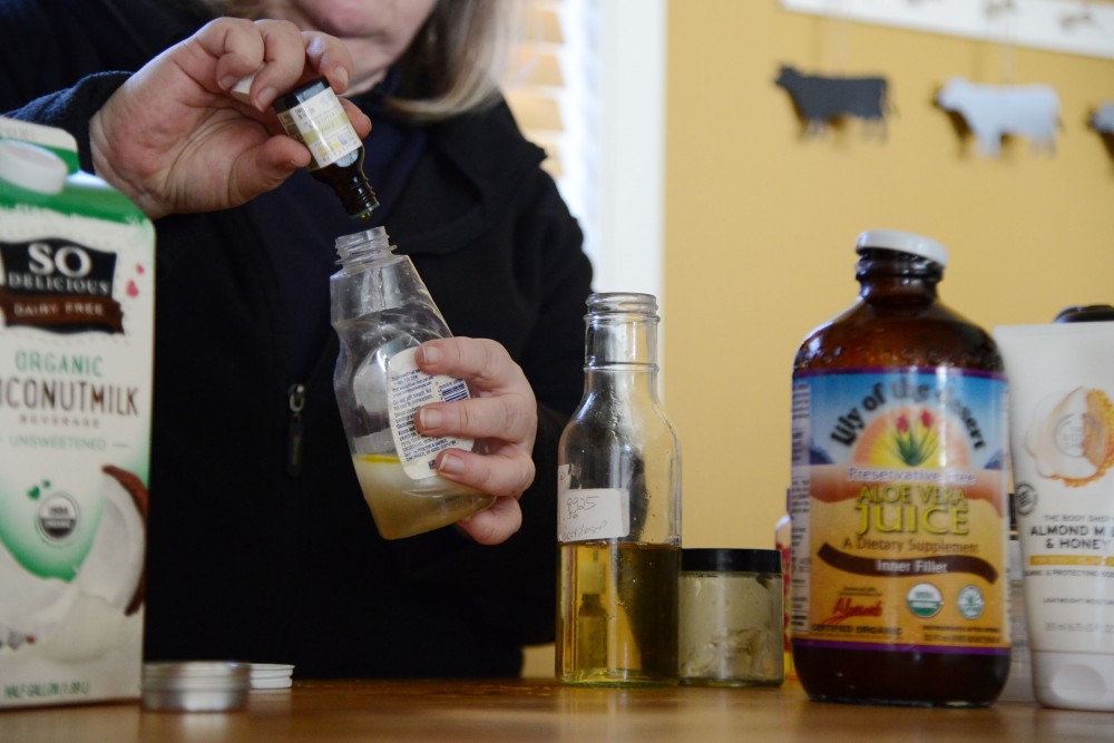 Allison Sandve mixes together homemade shampoo on Sunday, Feb. 24 at her home in St. Paul. Sandve started living a plastic-free lifestyle almost a year ago and plans to continue exploring ways to incorporate sustainability into her life.