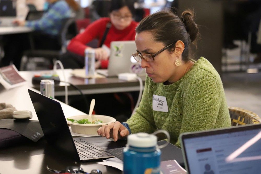 Pamela Rueda Cediel edits Wikipedia profiles for females in science at Wilson Library on Thursday, March 7.