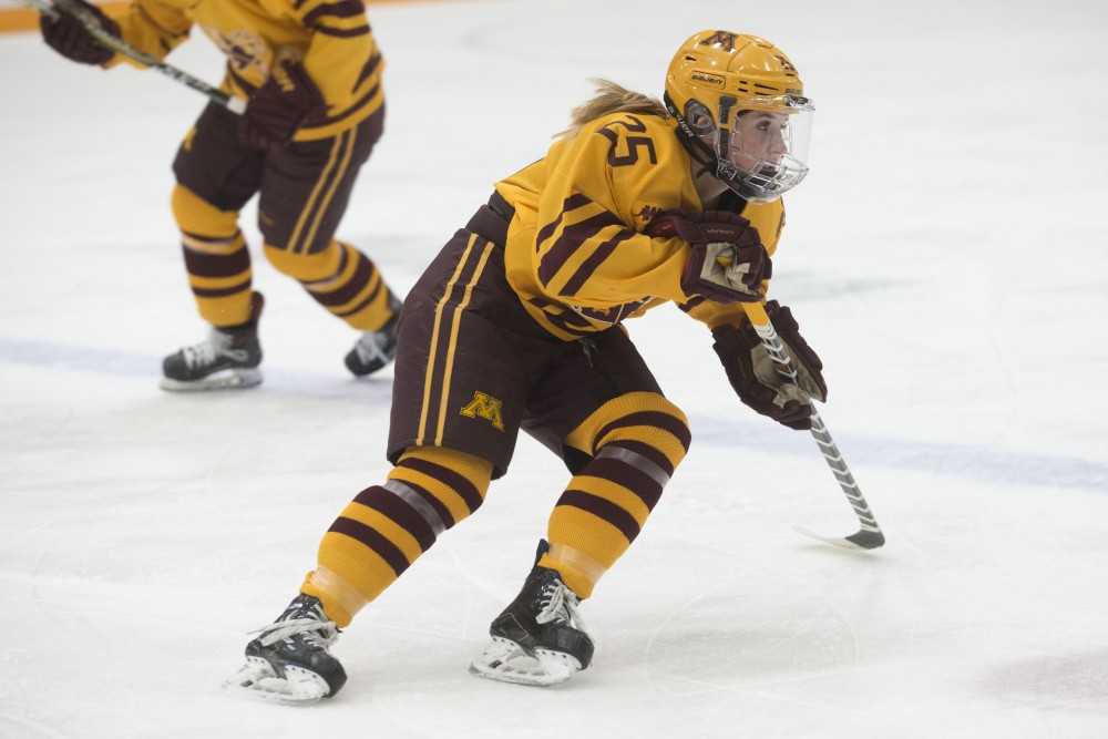 Forward Nicole Schammel skates down the ice on Saturday, March 9 at Ridder Arena.