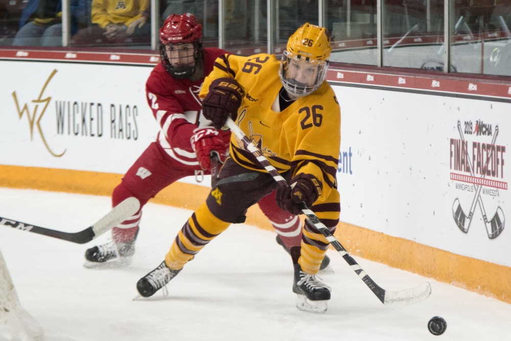 Forward Sarah Potomak chases after the puck at Ridder Arena on Sunday, March 10. 