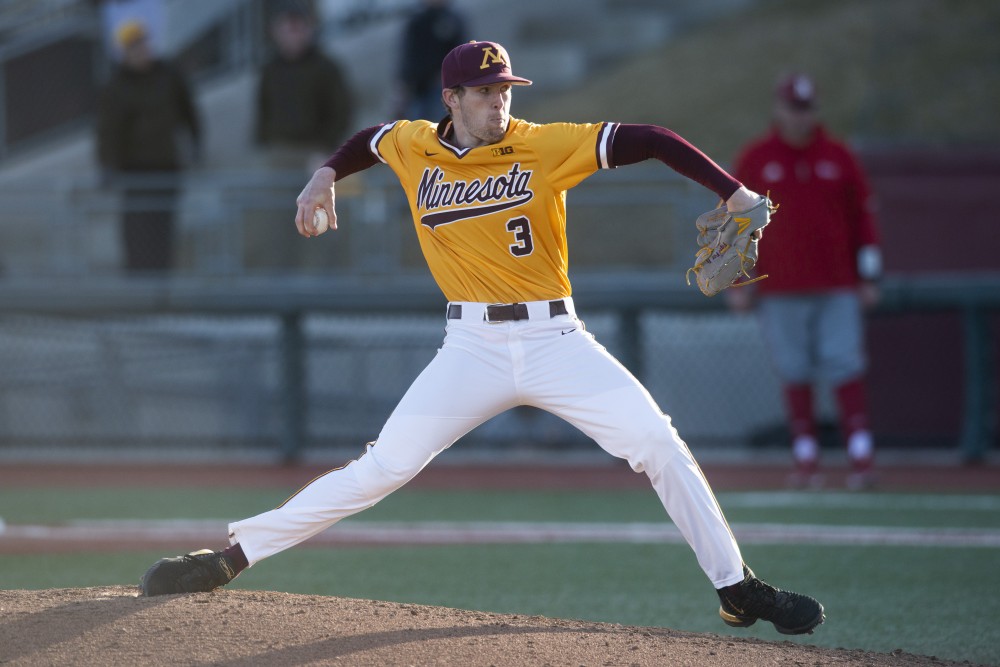 Pitcher Brett Schulze throws the ball at Siebert Field on Friday, March 29. Eli Wilsons home run in the bottom of the tenth inning lead the Gophers to a 5-2 win over Nebraska. 