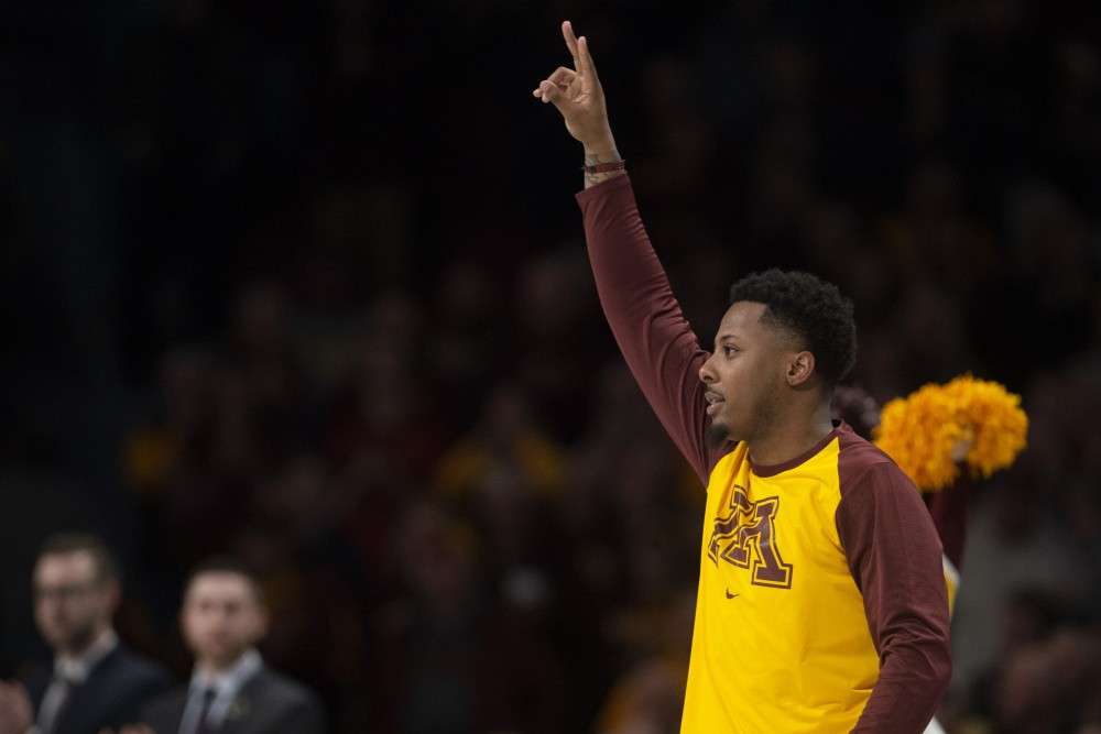 Senior Jarvis Johnson gets called during the Gophers team introductions before their game against Purdue on Tuesday, March 5 at Williams Arena.