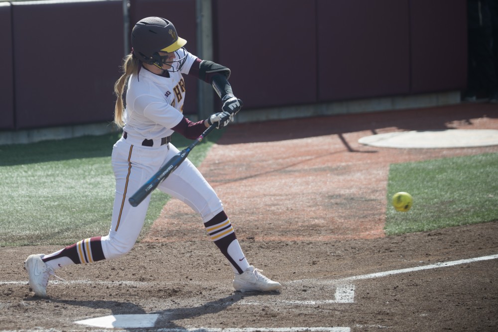 Senior Taylor Chell hits the ball on Friday, March 29 at Jane Sage Cowles Stadium in Minneapolis. The Gophers beat the Purdue Boilermakers 5-1.