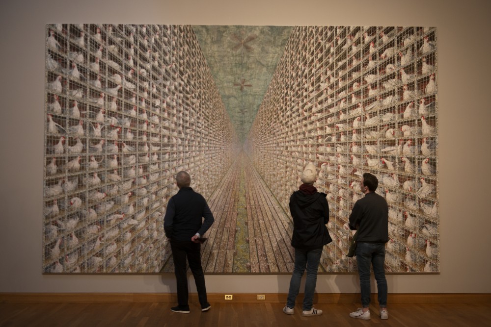 Guests take time to observe art up close on Slow Art Day at Weisman Art Museum on Saturday, April 6 in Minneapolis. Instead of spending fifteen seconds looking at pieces of art, Slow Art Day asks viewers to take fifteen minutes.