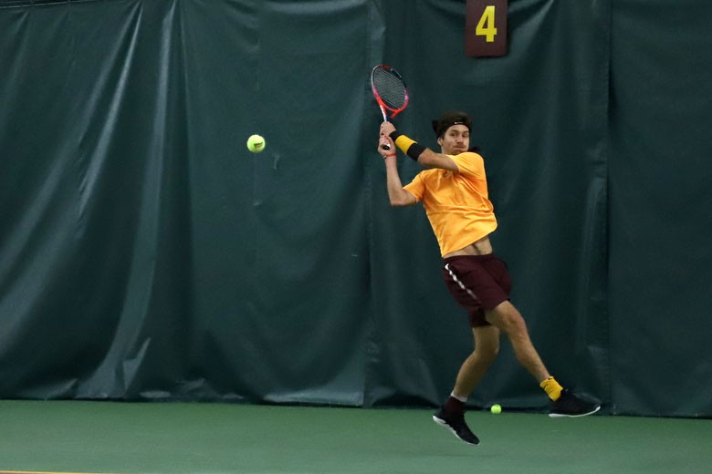 Junior Stefan Milicevic competes in his singles match on Friday, April 5th, 2019.