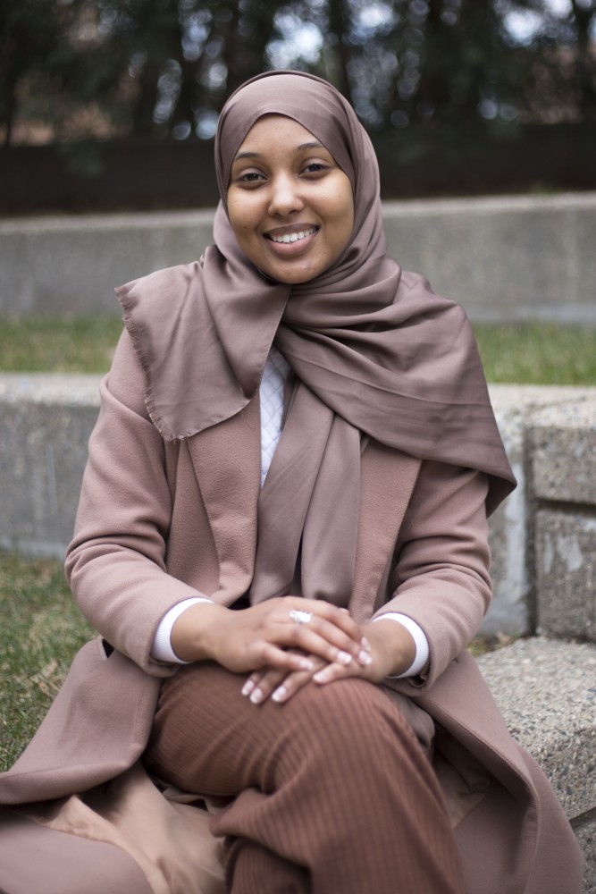 Urban and Regional Planning Masters student Kowsar Mohamed poses for a portrait outside Wilson Library on Tuesday, March 9. Mohamed grew up in Cedar-Riverside and hopes to help communities similar to it through her career in urban planning.