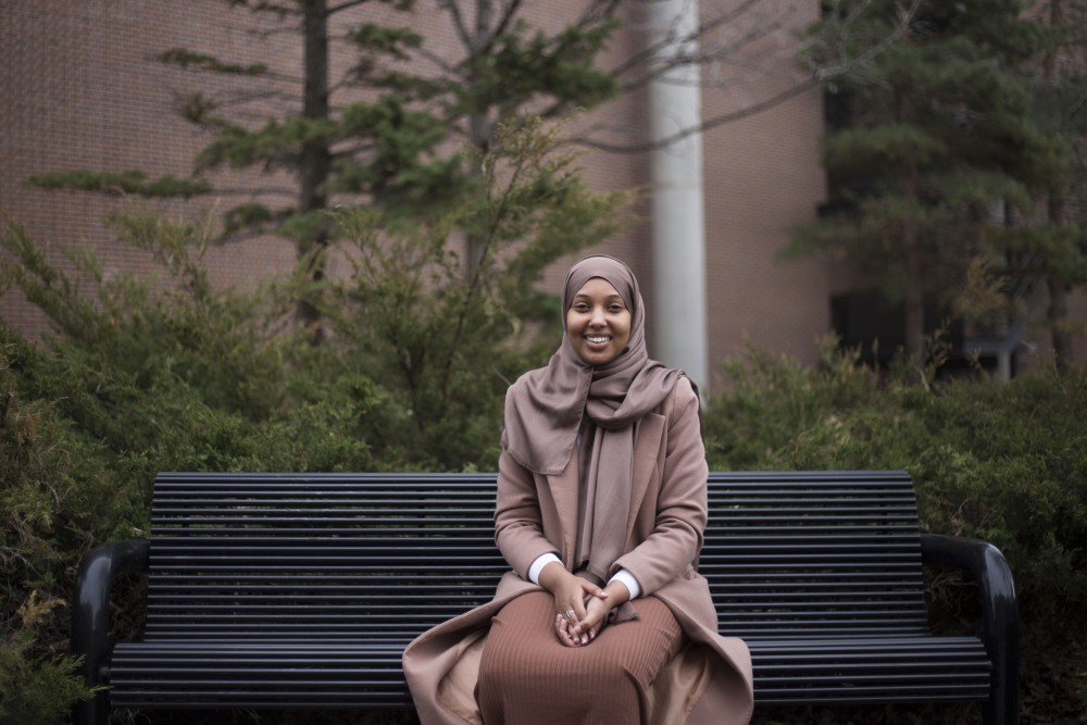Urban and Regional Planning Masters student Kowsar Mohamed poses for a portrait outside Wilson Library on Tuesday, March 9. Mohamed grew up in Cedar-Riverside and hopes to help communities similar to it through her career in urban planning.