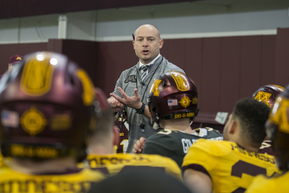 Head coach P.J. Fleck talks to the team on April 13, 2019 in the indoor football practice facility in Athletes Village.