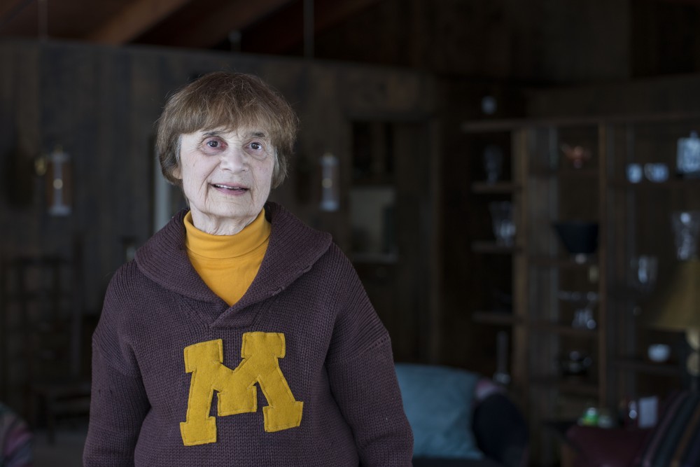 University Regent Linda Cohen poses for a portrait on Saturday, April 13 in her home in Minnetonka, Minn. The cardigan she is wearing was her father, Louis Gross from his time at the University in the 1920s. 