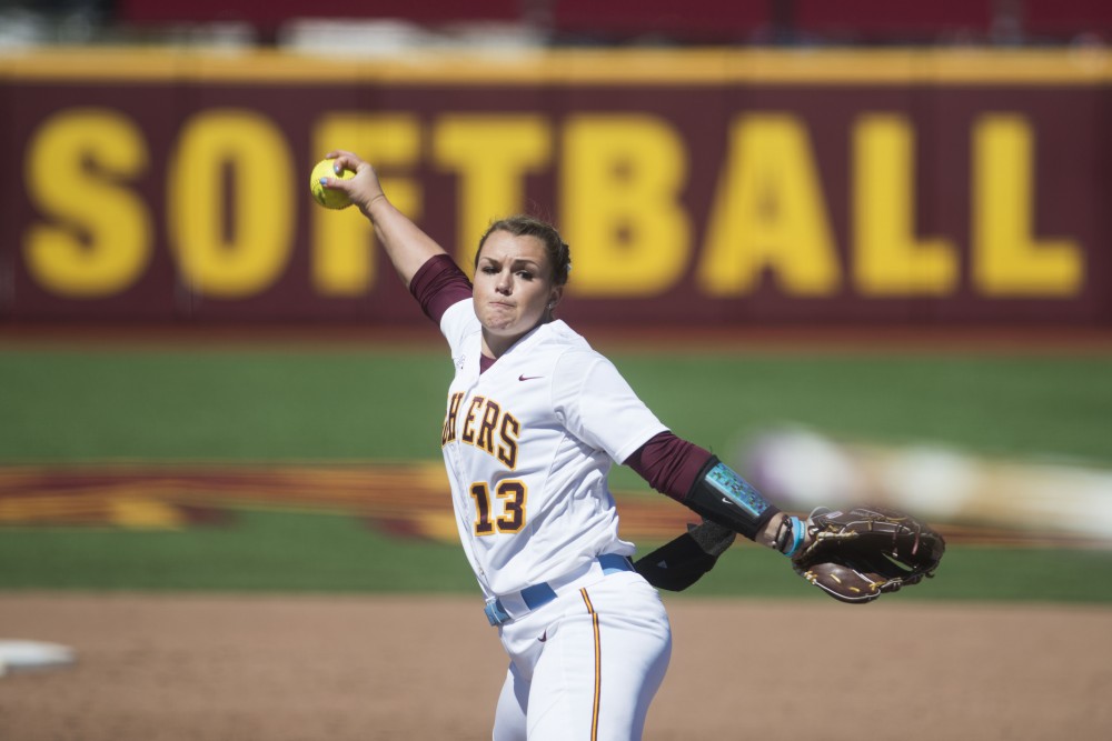 Amber Fiser throws a pitch at Jane Sage Cowles Stadium on Sunday, April 14. The Gophers beat Michigan State two games to none as part of their double header. 