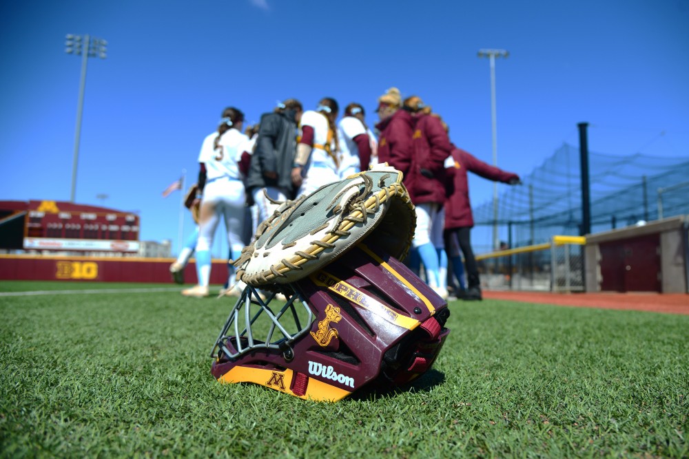 The Gophers huddle before the second game of their double header against Michigan State at Jane Sage Cowles Stadium on Sunday, April 14. They won two games to none. 