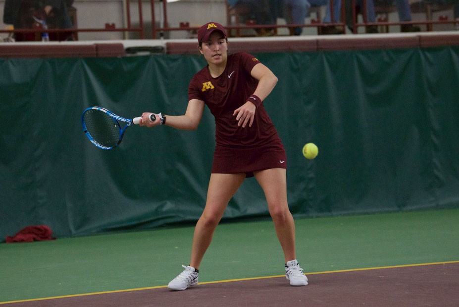 Caitlyn Merzbacher returns the ball at the Baseline Tennis Center on Friday, April 12.