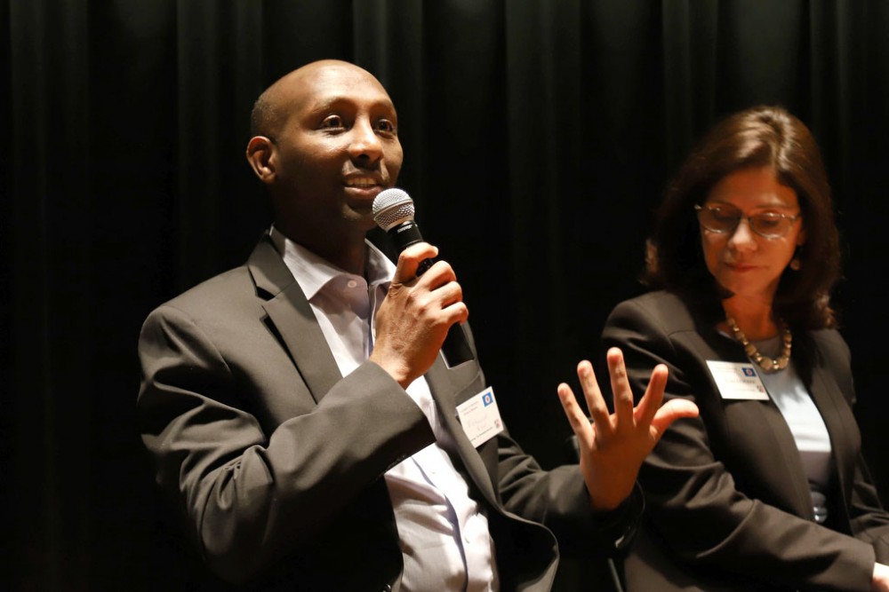 Minnesota House Representative Mohamud Noor speaks during a discussion on Tuesday, April 16 at Northrop Auditorium. People from the University, state lawmakers and environmental experts met to discuss an exchange with Germany to discuss ideas about renewable energy and climate change. 