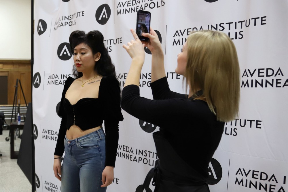 Model Adrianna Manirath has her photo taken back stage for the Catwalks for Water Aveda fashion show on Saturday, April 20.