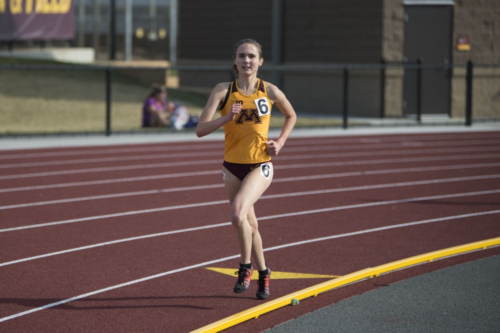 Junior Abby Kargol runs the 1500 meter relay at the Minnesota Track & Field Stadium in Minneapolis for the Gopher womens Twilight Meet on Wednesday, April 24. 
