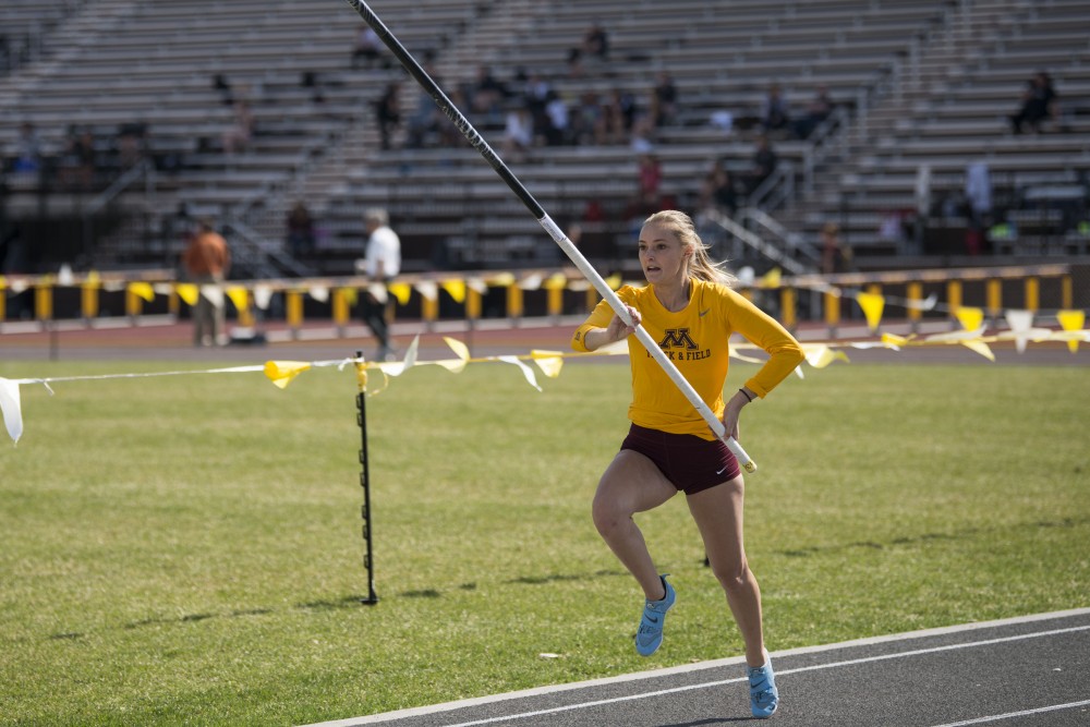 Senior Karlie Place practices the pole vault at the Minnesota Track & Field Stadium in Minneapolis for the Gopher womens Twilight Meet on Wednesday, April 24. 