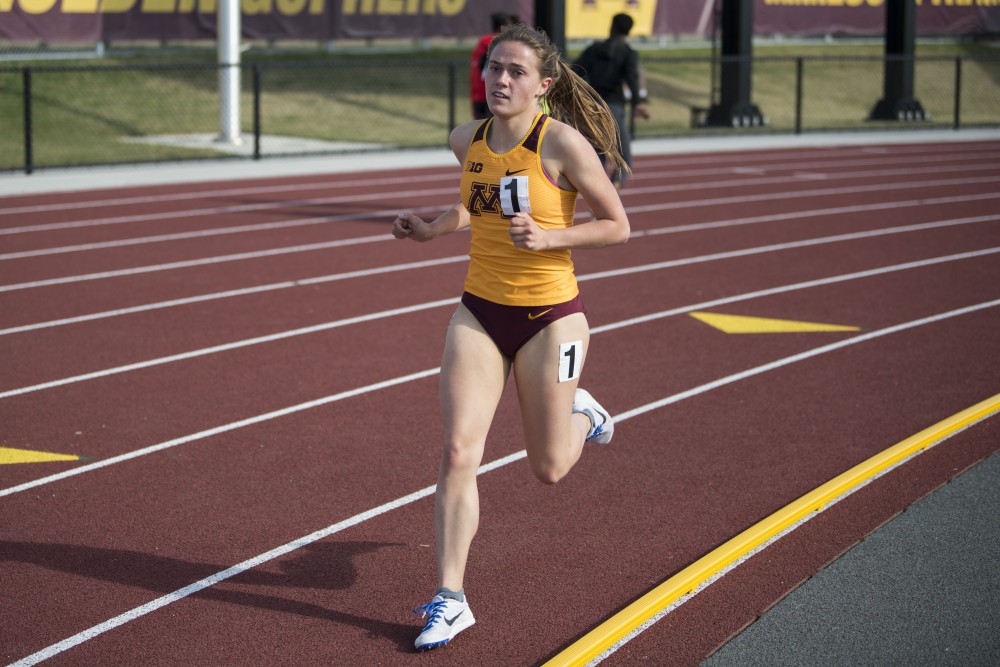 Sophomore Sarah Werking runs the 1500 meter relay at the Minnesota Track & Field Stadium in Minneapolis for the Gopher womens Twilight Meet on Wednesday, April 24. 