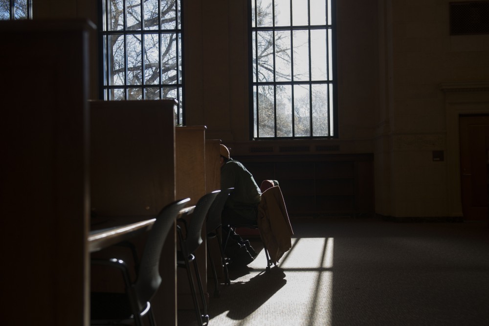 9:36 a.m.
A student studies on the second floor of Walter Library.