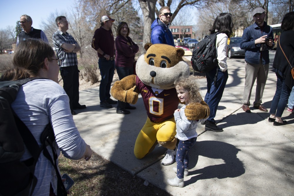 12:11 p.m.
Mae Rudeen poses with Goldy the Gopher at the Bell Museums Destination Discovery event in St. Paul.