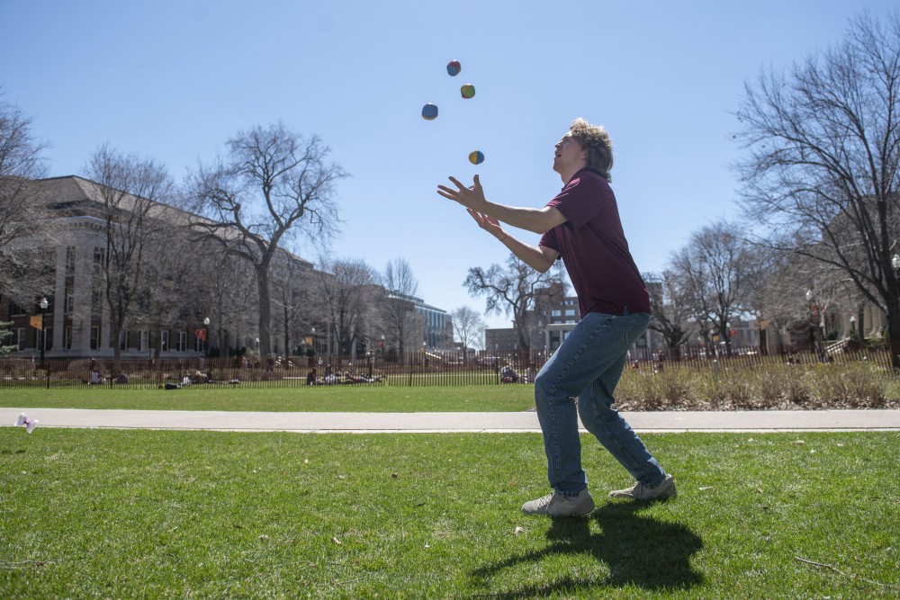 12:44 p.m.
Industrial and systems engineering student Ricky Sipila practices juggling. Sipila is a member of the Universitys juggling club. 