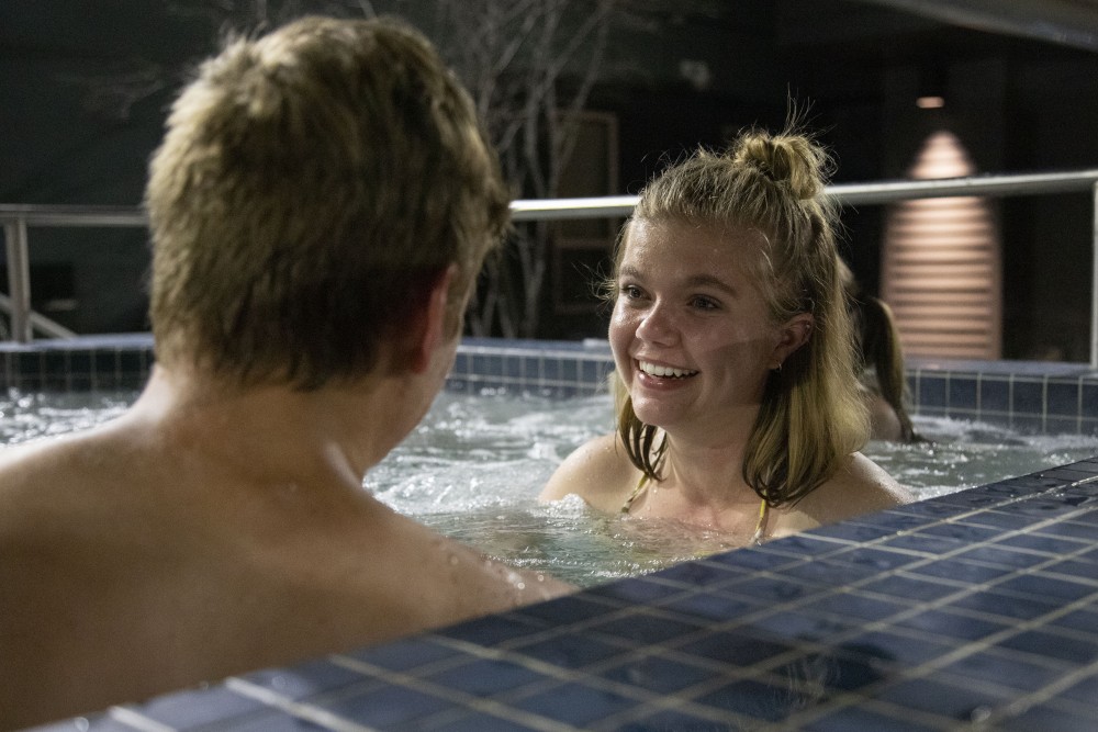 10:55 p.m.
Claire Nash talks to Matt Hickmann in the hot tub at the Radius to relax after a long week.