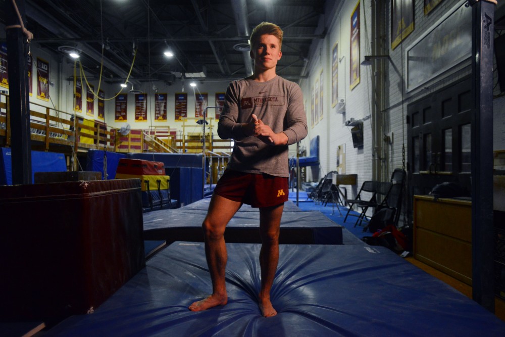Sophomore Shane Wiskus poses for a portrait in Cooke Hall on Friday, April 30. Wiskus was named the Big Ten Gymnast of the Year for the second consecutive season and was the 2019 NCAA Men’s Parallel Bars champion. 