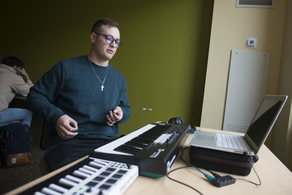 Noah Berghammer explains his music production setup in 17th Avenue Residence Hall on Wednesday, May 1. Berghammer sees music as a complimentary hobby to baseball, noting that one doesnt detract from the other. 