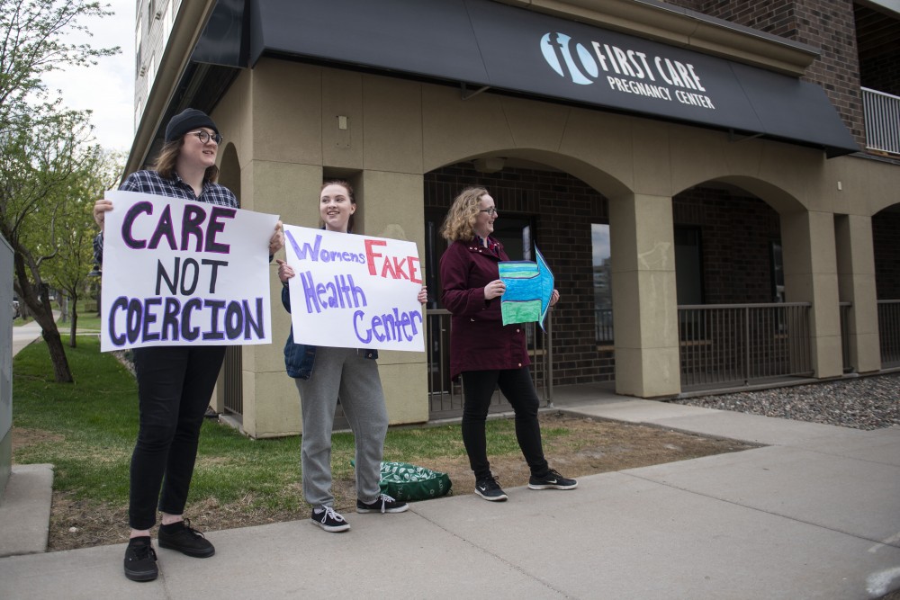 Members of the University Pro-Choice Coalition protest outside of the First Care Pregnancy Center on Monday, April 29 in Minneapolis. 