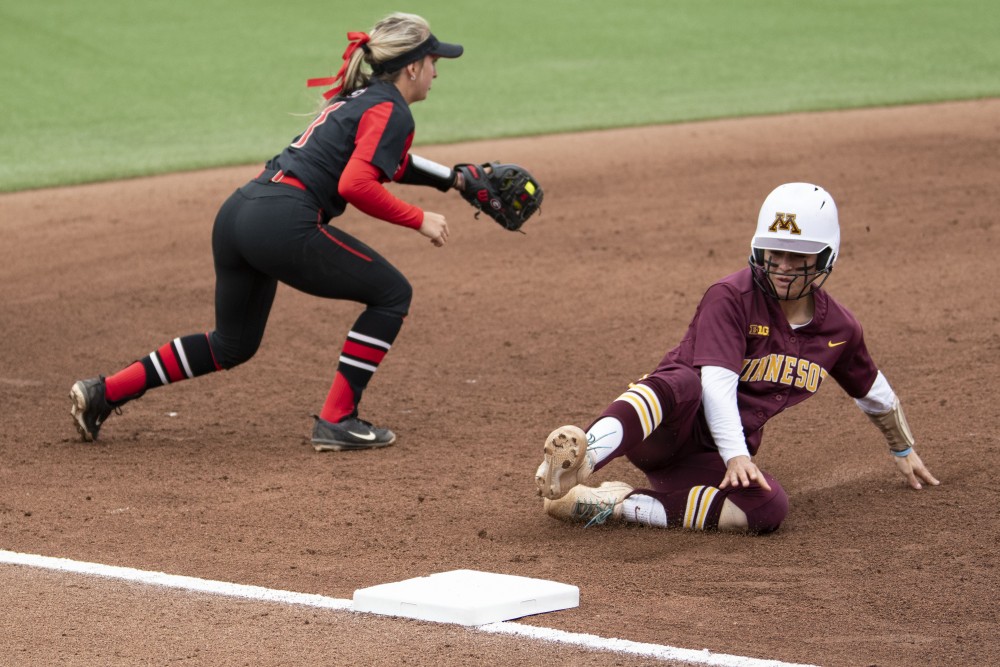 Senior Allie Arneson slides to third base on Saturday, May 18 at the Jane Sage Cowles Stadium in Minneapolis. The Gophers beat the University of Georgia 2-1.