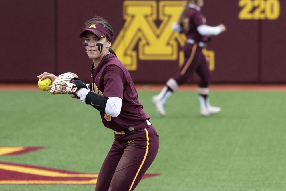 Junior Makenna Partain prepares to throw the ball to first base on Saturday, May 18 at the Jane Sage Cowles Stadium in Minneapolis. The Gophers beat the University of Georgia 2-1.