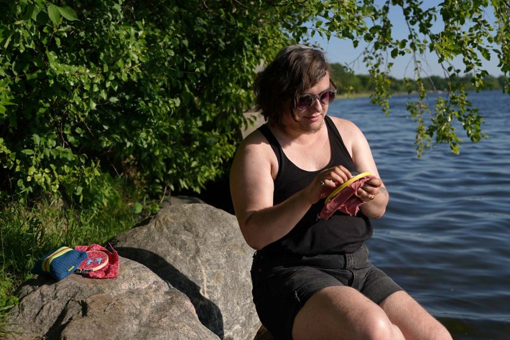Liza Gorman-Baer works on an embroidery piece at Lake Calhoun on Saturday May 8th. 