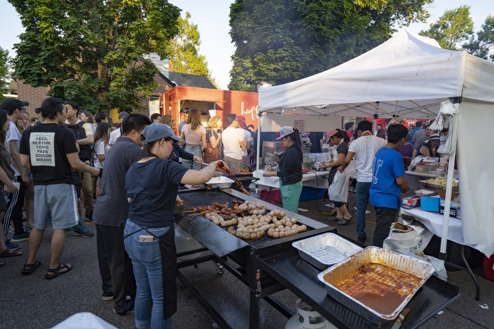 Food is made on Saturday, July 6 in St. Paul for the annual Little Mekong Night Market. Vendors filled the streets selling Southeast Asian cuisine and street food.