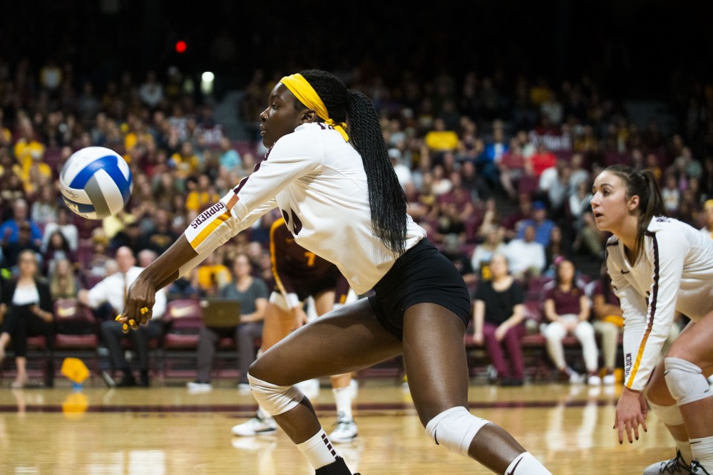 Outside Hitter Adanna Rollins receives a serve at the Maturi Pavilion on Saturday, Sept. 7. The Gophers defeated Florida 3 sets to 0 for their home opener. 