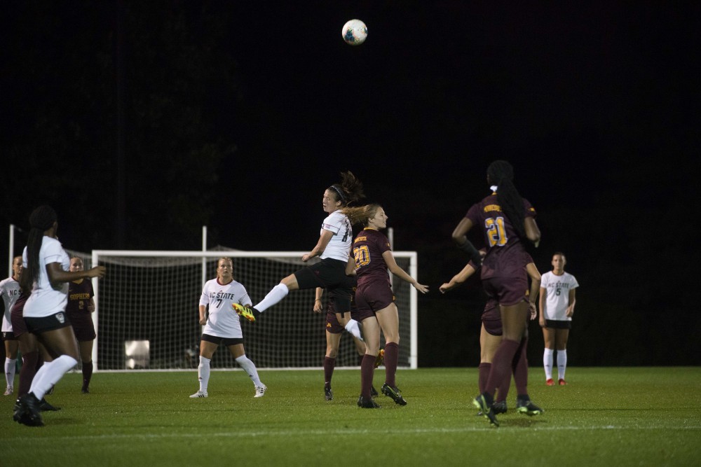 Midfielder Paige Elliot heads the ball at Elizabeth Lyle Robbie Stadium on Thursday, Sept. 12. The Gophers defeated North Carolina State 1-0.  