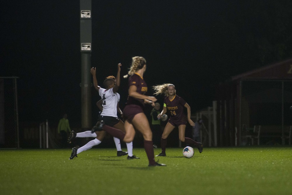 Defender Marisa Windingstad looks to pass the ball at Elizabeth Lyle Robbie Stadium on Thursday, Sept. 12. The Gophers defeated North Carolina State 1-0.  