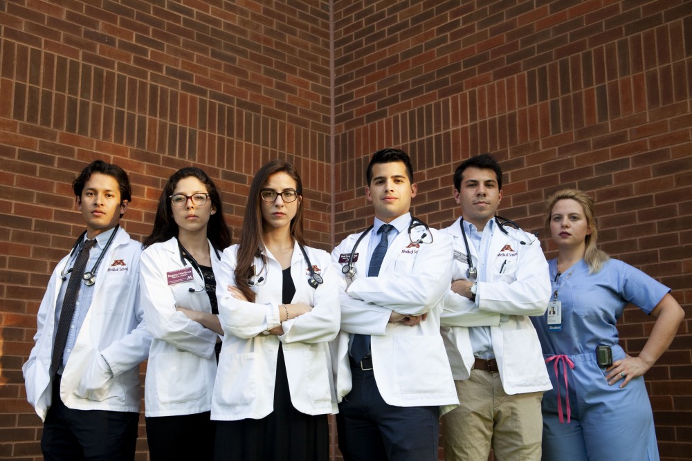 University of Minnesota Medical Students, from left, Omar Cespedes, Regina Lorenzo,  Karina Romo, David Molinar, Santana Sanchez, and Angelina Omodt-Lopez pose for a portrait on the West Bank Campus on Tuesday, Sept. 17, 2019.  They played a key role in the organization of a student movement protesting inhumane treatment at the U.S.-Mexico border and supported the passage of HR 3239, a bill that would ensure basic hygiene necessities for those detained. (Kamaan Richards / Minnesota Daily)


