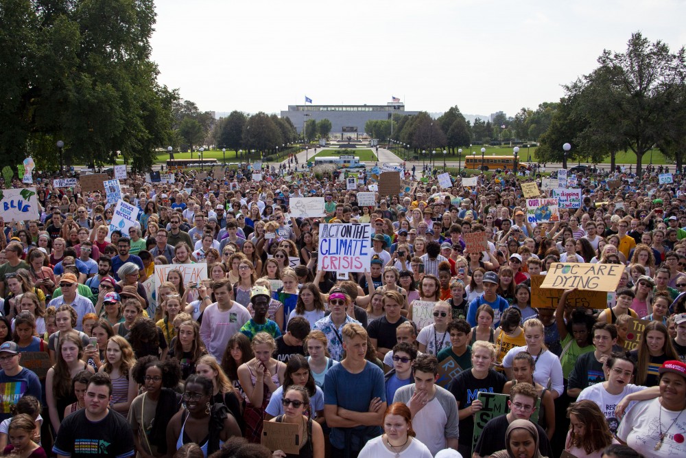 Crowds gather on the lawn in front of the Minnesota State Capitol Building on Friday, Sept. 20, 2019. The Global Climate Strike is a national movement led by youth organizers in protest of current environmental policies. 