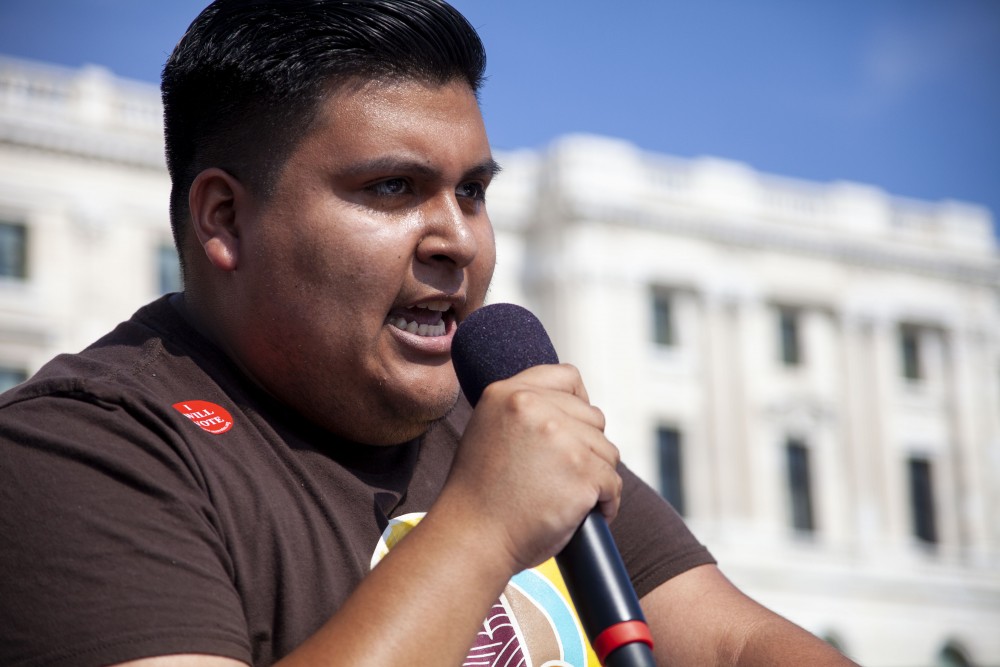 COPAL Environmental Justice Organizer Marco Hernandez delivers a prepared speech to those gathered at the Minnesota State Capitol Building on Friday, Sept. 20, 2019. One of several speakers at the Global Climate Strike, Hernandez advocated for improved environmental legislation and acknowledged the risks climate change poses to marginalized communities. 