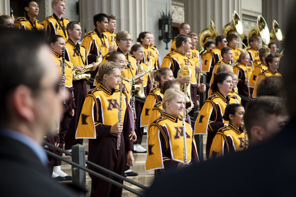 The Marching Band prepares to perform for the inauguration of Joan Gabel, the 17th President of the University of Minnesota, outside Northrop Memorial Auditorium on Friday, Sept 20, 2019. (Jasmin Kemp / Minnesota Daily)