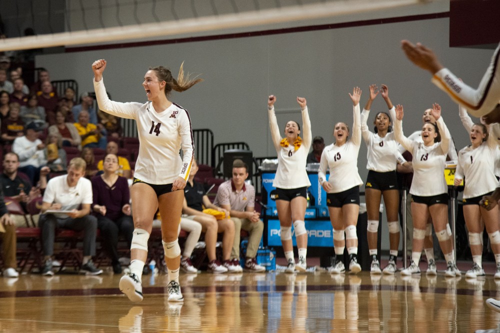 Setter Kylie Miller celebrates a play at the Maturi Pavilion on Friday, Sept. 27, 2019. The Gophers went on to defeat Indiana three matches to none. 