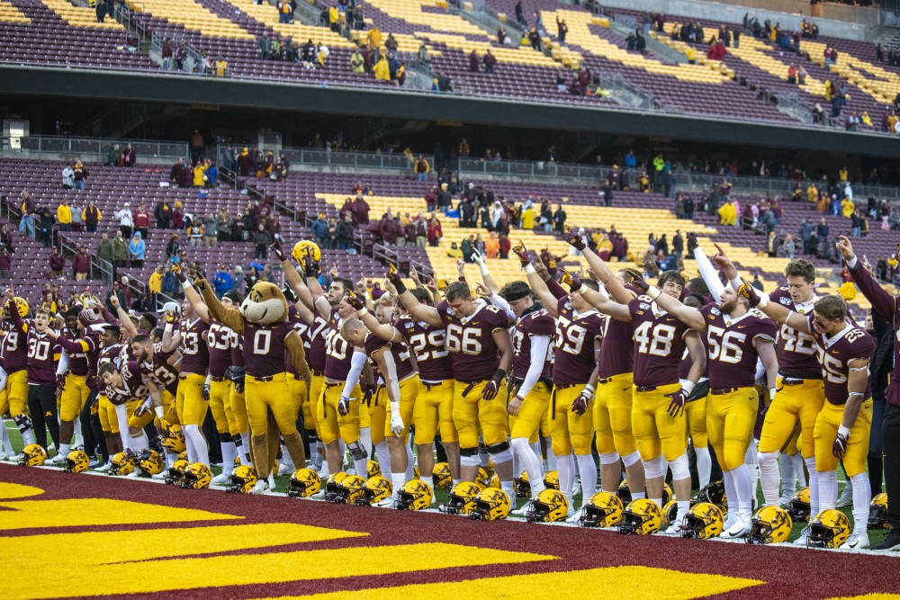 The Gophers celebrate a win at TCF Bank Stadium on Saturday, Oct. 5, 2019. They defeated Illinois 40 to 17 to bring their record to 5-0. (Jasmin Kemp / Minnesota Daily)