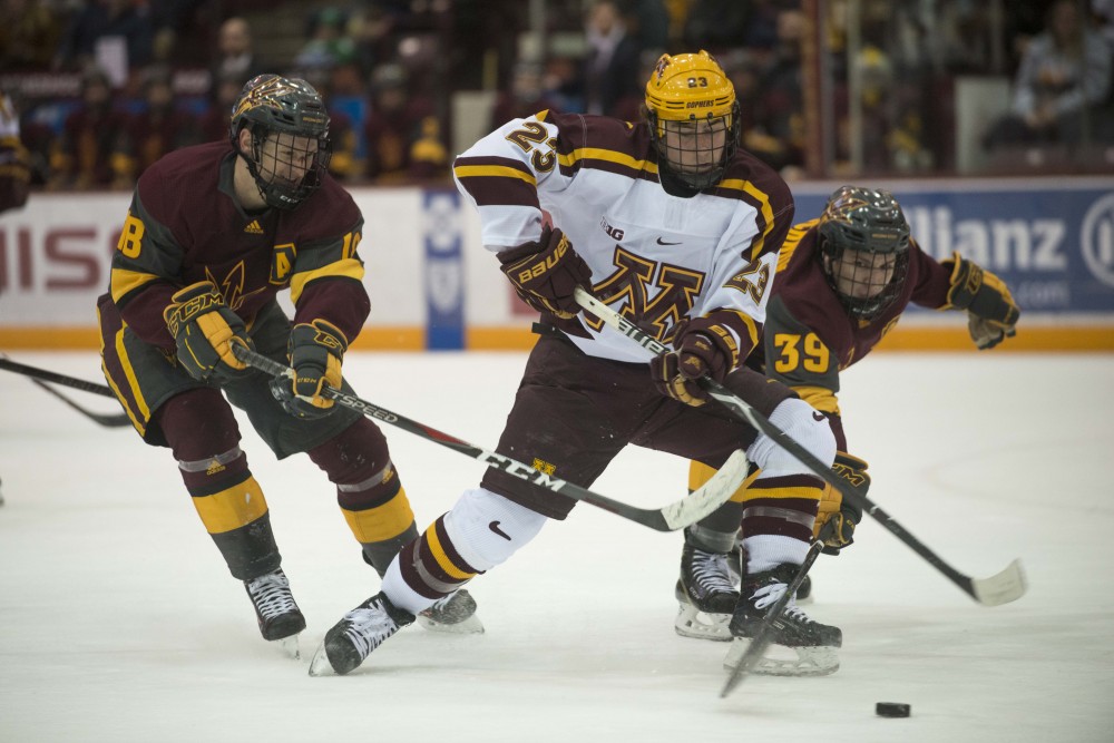 Forward Ryan Norman skates after the puck at 3M Arena at Mariucci on Friday, Mar. 1. The Gophers defeated Arizona State 5-1. 