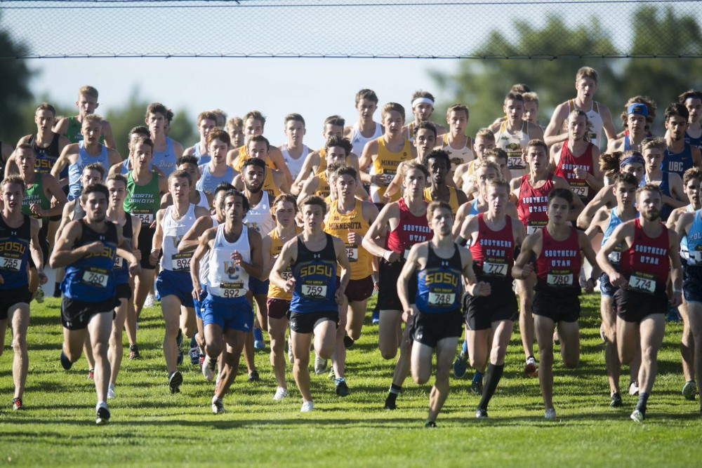 The Gophers mens cross country team merges with the field at the beginning of the 2019 Roy Griak Invitational at the Les Bolstad Golf Course on Saturday, Sept. 28, 2019. The mens team placed 7th in the Division 1 race. 